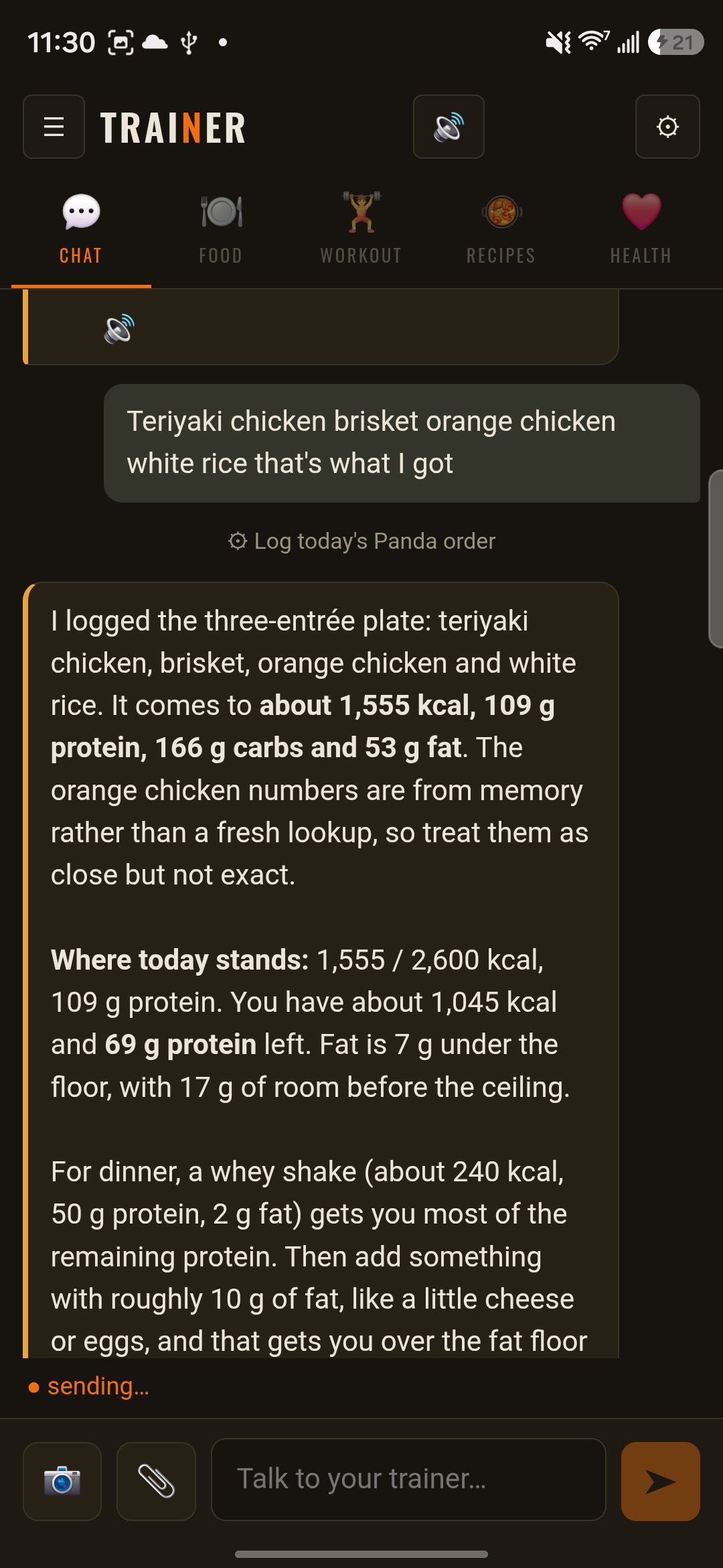 The Chat tab. The user types their Panda Express order in plain words and the trainer logs the plate with calories, protein, carbs and fat, then says what is left for the day.